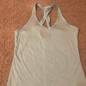 Champion turquoise tank top and purple/grey bra